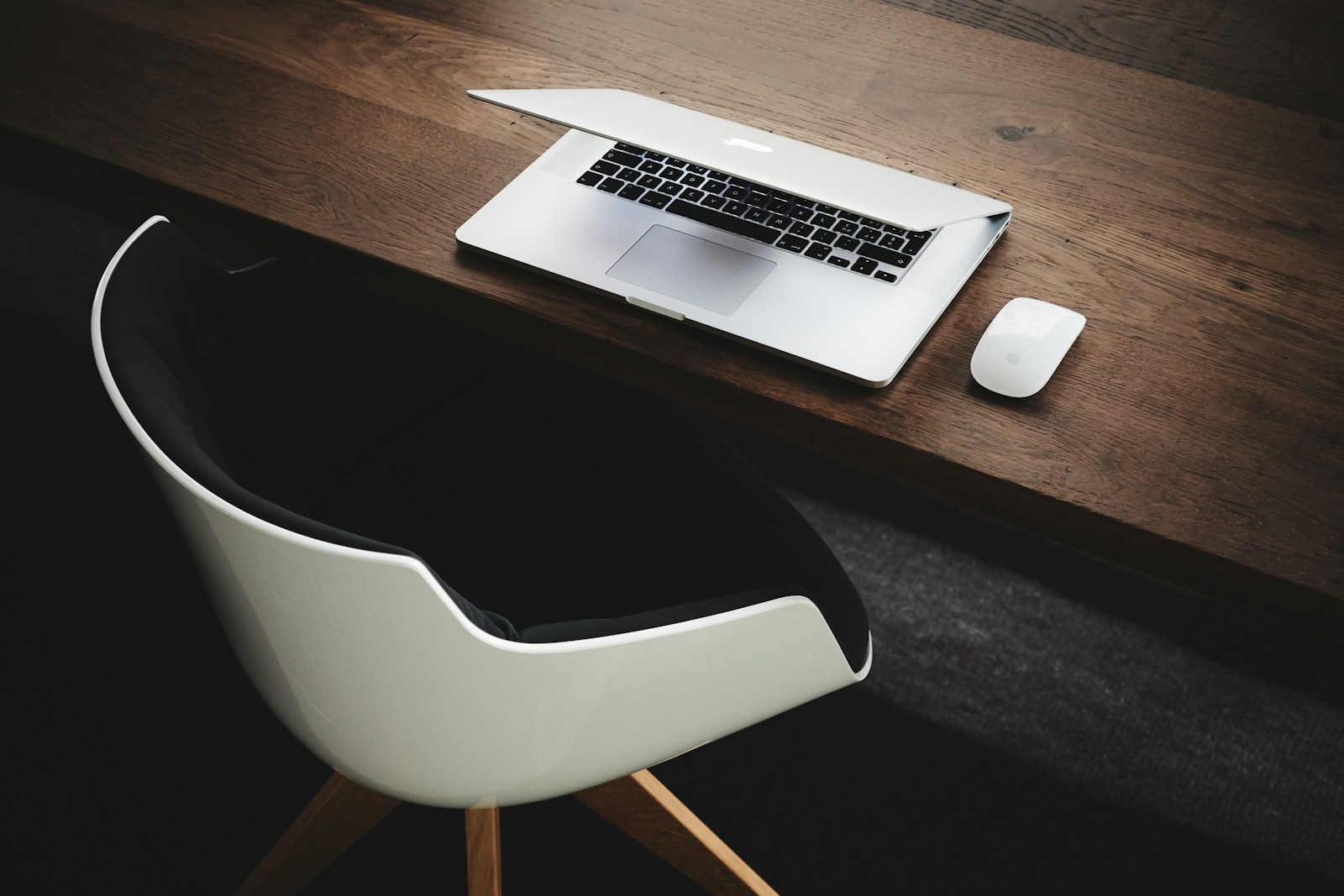 Apple MacBook on clean executive desk